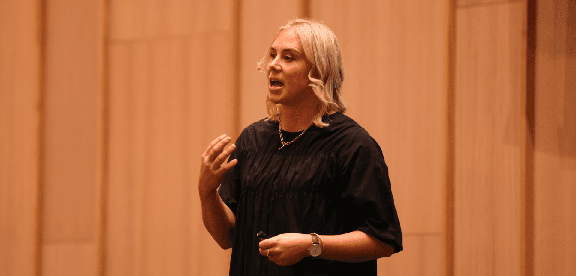 Sarah speaking at event
